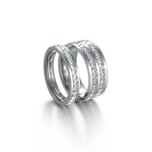 Detailed close-up of two polished silver steel rings with square zirconia inlay set
