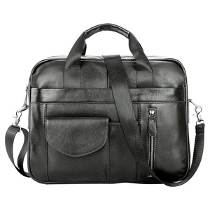 Detailed close-up of premium black pebbled leather texture on business briefcase