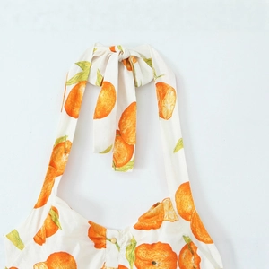 Halterneck-Leinenkleid mit realistischem Orangenfrucht-Druck und mittlerem Knopfdetail