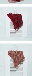 Three checkered scarves in red, pink, and brown with decorative fringe detail