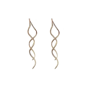 Close-up of rose gold wavy tassel drop earrings with textured twisted metal design