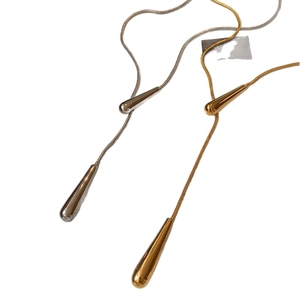 Minimalist gold and silver teardrop Y-necklaces with smooth metallic snake chains