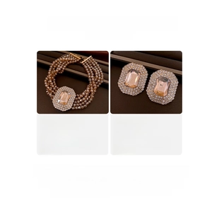 Detailed specs for layered champagne necklace and earrings set with crystal inlay