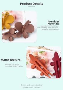 Detail of matte butterfly hair clips in earthy tones like ginger and coffee brown