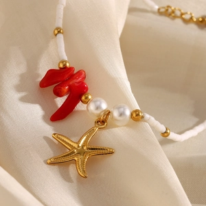 18K gold plated stainless steel starfish necklace with white pearls and red coral accents