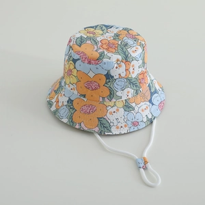 Detail of kids bucket hat with floral bear prints and adjustable white windproof chin strap