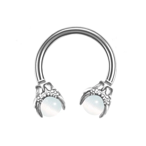 Detail of horseshoe circular barbell featuring silver eagle claw ends holding opal stones