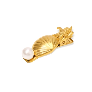 Barrette dorée en forme de coquillage et étoile de mer avec une perle blanche nacrée