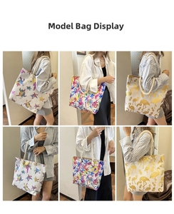Detail view of canvas tote bags with tropical prints and rope handles worn by a model