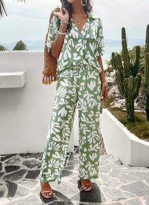 Women's summer two-piece set featuring green floral short sleeve shirt and wide-leg trousers