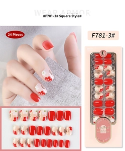 Detailed view of red floral pattern square press-on nails with 24 pieces in retail box