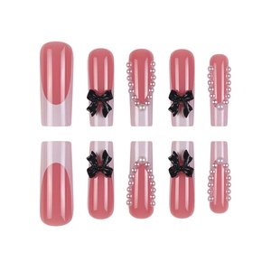 Rosa French Nails mit schwarzen Schleifen und Perlen, lange Coffin-Nägel zum Aufkleben