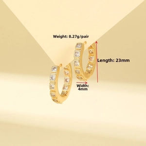 Detail view of gold geometric hoop earrings with square zircon stone and dimensions