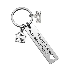 Silver stainless steel New Home New Adventure keychain with 2025 year tag and house charm