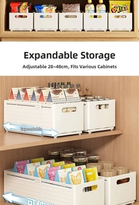 Detail view of white expandable kitchen cabinet organizer with 28-48cm stretch range