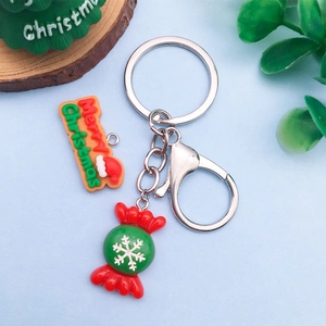 Detail of Christmas keychain set with Merry Christmas tag and candy charm accessories