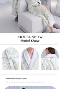 Detail view of bean green fleece bathrobe showing textured floral pattern and waist tie