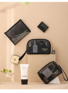 Three sizes of black mesh cosmetic bags with gold Fashion Girl logo and zipper