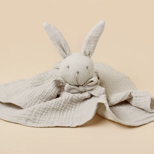 Close-up of light grey cotton muslin baby security blanket with plush rabbit head