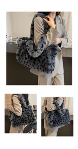 Detailed view of gray leopard print faux fur tote bag with wide plush shoulder strap