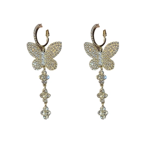 Elegant gold butterfly tassel earrings with sparkling rhinestones and white pearls