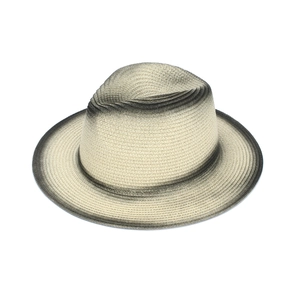 Detail of gradient Panama straw hat showing grey to beige woven texture and teardrop crown