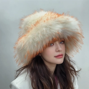 Detailed texture of fluffy white and orange faux fur on a stylish oversized bucket hat