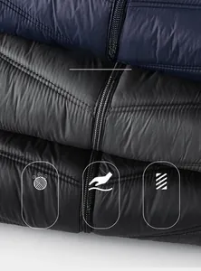 Detail of quilted vests in navy, grey, and black with durable metal zippers