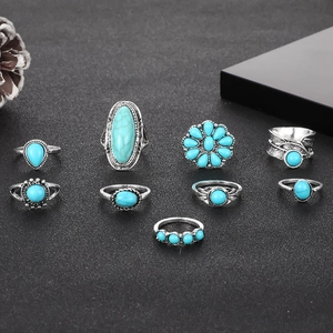 Bohemian 9-piece vintage silver ring set with turquoise feathers and floral patterns