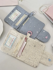 Star pattern canvas wallet folder in light blue and beige with metal zipper and card slots