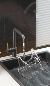 Close-up of a transparent U-shaped kitchen lid holder showing easy cleaning on marble counter