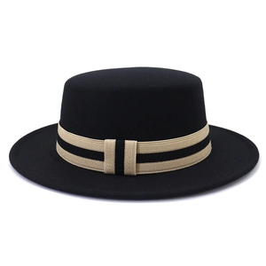 Detailed view of the striped ribbon band on a black flat top wool felt boater hat