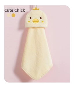 Close-up of yellow chick hanging hand towel with soft coral fleece and cute embroidery