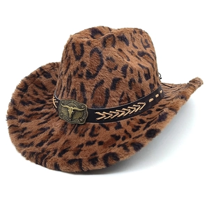 Detail of leopard print faux fur cowboy hat featuring a bronze bull skull metal emblem