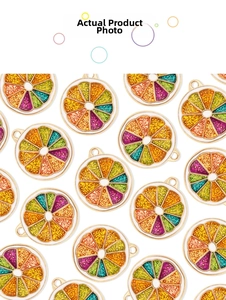 Macro shot of colorful citrus slice pendants with gold metal frames for DIY jewelry