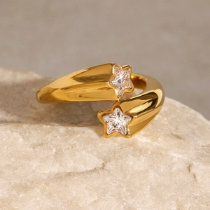 Polished gold stainless steel wrap ring with sparkling star-shaped zircon stones