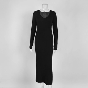 Detail of V-neck knitted dress with ribbed texture and long sleeves in slim fit