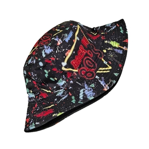 Detailed view of back to 80s graffiti print and stitching on black bucket hat