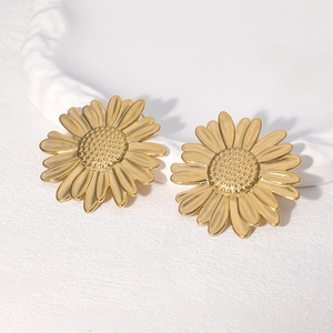 Elegant 18k gold plated stainless steel sunflower stud earrings on white surface