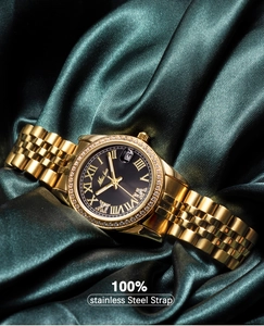 Detailed shot of Miss Fox watch with black dial and diamond bezel on green silk cloth