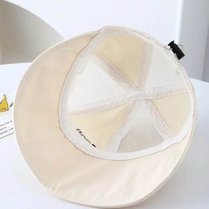 Detail of baby sun hat featuring breathable mesh crown and adjustable drawstring buckle