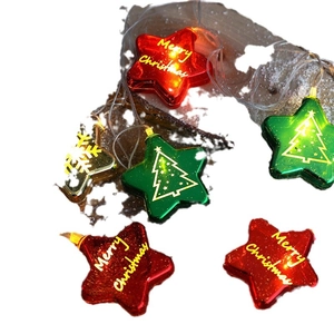 LED star string lights in red, green and gold with Merry Christmas patterns