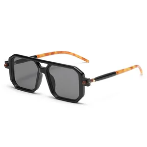 Modern double bridge square sunglasses for men with tortoiseshell temples and grey lenses