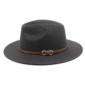 Classic black straw fedora hat with a brown leather strap and gold buckle on white background