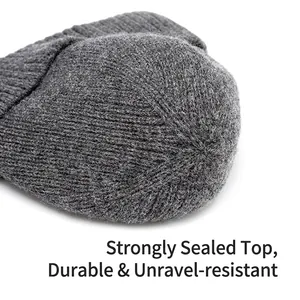 Grey knit beanie for men with durable reinforced top stitching and soft wool texture