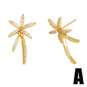 Elegant gold coconut tree earrings with sparkling zircon crystals in a minimalist style