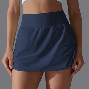 Close-up of high-waist cooling tennis skort with hidden pocket and pleated hem