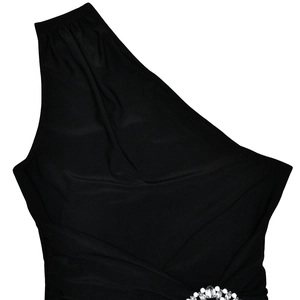 Detail of black one-shoulder dress showing smooth elastic fabric and rhinestone waist decor