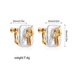 Detailed view of baroque pearl earrings with golden flower accents and measurements