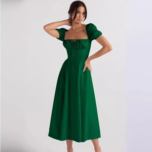 Elegant emerald green high-waisted midi dress with puff sleeves and square neckline